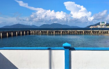 TAREMPA ISLAND, INDONESIA - NOVEMBER 27 2019: view of the ocean in the mountains with blue sky. This place is very awesome