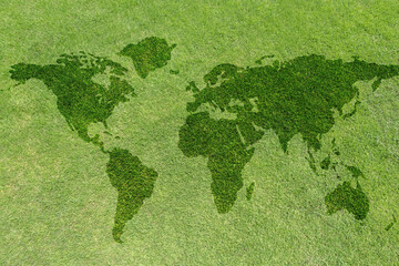 World map on green grass lawn background for global eco-friendly environment, ecological and...
