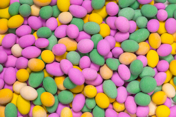Fototapeta na wymiar Group of colorful peanuts in glaze.