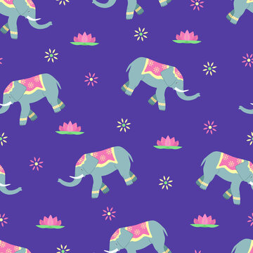 Seamless pattern of decorated elephant, lotus and flower patterns. The concept of Indian culture. Cute cartoon background. © Elenglush