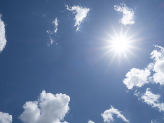 Naklejka na ściany i meble Brillant sun shining in blue sky overhead in southwest Florida USA