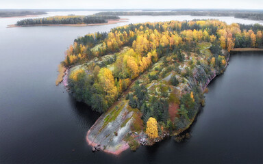Autumn in Vyborg bay, aero view of clean nordic nature. Beautiful rocks and cliffs with woods in North Europe, Baltic sea, gulf of Finland.