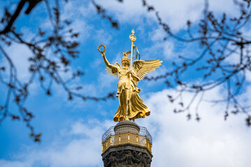 Fototapeta na wymiar Berlin Victory Column at sunny cloudy day