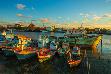 Many boats moored in sunrise morning time at Chalong port, Main port for travel ship to krabi and...
