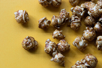 Caramel Pop corn on Yellow background