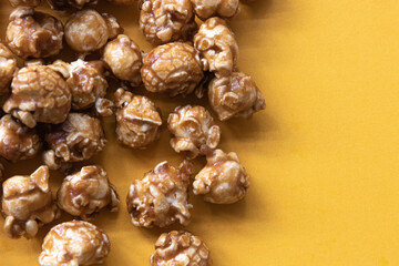 Caramel Pop corn on Yellow background