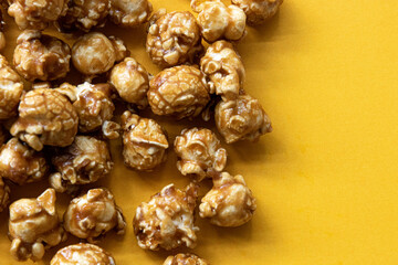 Caramel Pop corn on Yellow background
