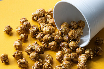 Caramel Pop corn on Yellow background