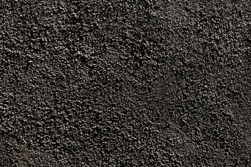 Grunge background black texture.Beautiful textured sand black background.