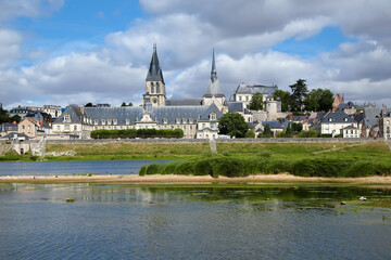 Blois, France. Picturesque landscape: Loire River, Abbey of Saint Lomer, Church of Saint Nicholas,...