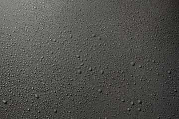 Water drops on a gray surface, a beautiful pattern of water splashes on the background - obrazy, fototapety, plakaty