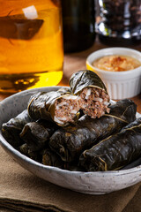 .Dolma, Sarma or Turkish Dolmades. Traditional Mediterranean dish Dolmadakia or Tolma. Stuffed grape leaves.