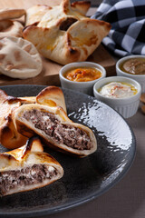 Meat sfiha. Typical Arabic dish that has been adapted for Brazilian cuisine.