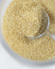 Top view of demerara sugar in a glass jar