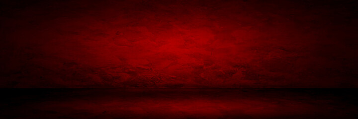Red background abstract gradient spotlight room texture background. Studio backdrop wallpaper light room cement wall color red and empty space.