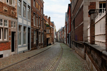 Fototapeta na wymiar Maastricht, Netherlands - November 8, 2020: Old town street in the center of Maastricht.