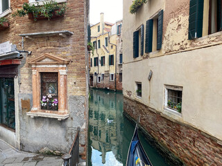 Venice in canals with Gondola boat, empty in Covid time