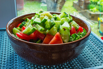 Closeup on malibu salad dressed with mayonnaise on the wooden table