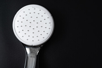 shower head on a black background. shower and bathroom accessories.