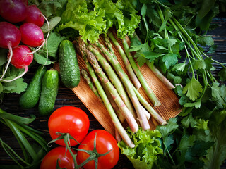 fresh organic vegetables on a wooden background