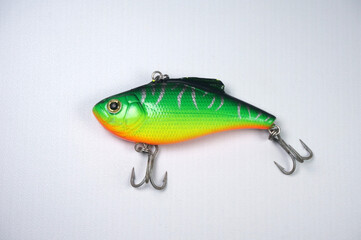 Plastic fishing lure on a white background. Home made fishing lure.   