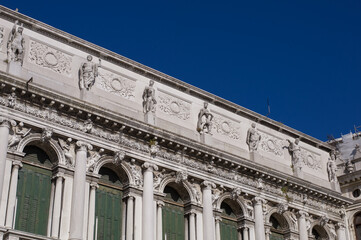 details of facades of square San Marco fresh early morning waiting to be floated with tourists