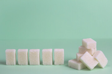 Sugar lumps. White death. Diabetes. Dangerous product.