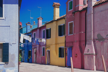 Fototapeta na wymiar bright colored sunny cozy streets of Burano