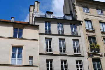 Fototapeta na wymiar The facade of a Parisian building. France, the 22th May 2021.