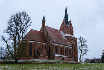 Fototapeta na wymiar Our Lady of Sorrows church (Kościół Matki Boskiej Bolesnej). Winter. Stargard County, Chociwel, Poland.