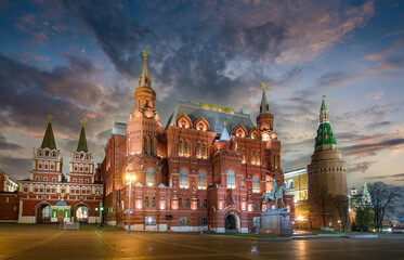 Fototapeta premium The State Historical Museum and part of the Kremlin on the Red square in Moscow, Russia at night. View from Manezhnaya Square. 