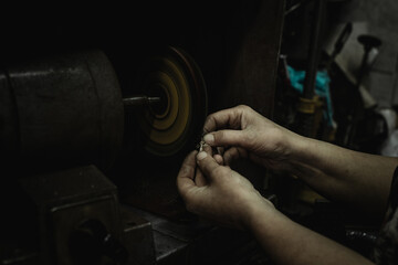 Fototapeta na wymiar Close-Up Of Repairing Ring By Polishing Motors Tool