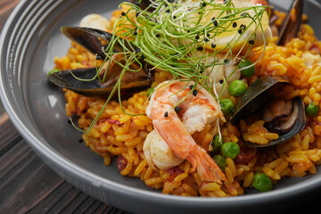 Pilaf with seafood and vegetables, close up