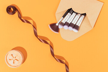 Professional makeup brushes and loose face powder