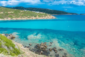 Foto op Plexiglas La Pelosa Strand, Sardinië, Italië Beautiful turquoise water of a bay in Asinara Island, Sardinia