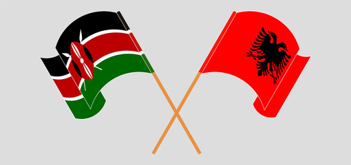 Crossed and waving flags of Kenya and Albania