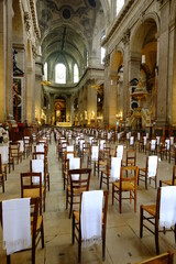 Fototapeta na wymiar The chairs disposal at the Saint-Sulpice parisian church, during the coronavirus pandemic. Paris, France the 22th May 2021.