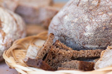 Rustic black bread in a basket.