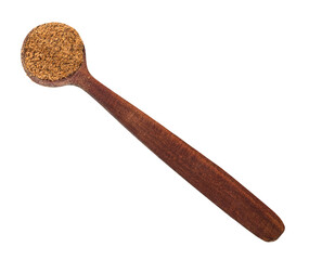 nutmeg powder in wooden spoon cutout on white