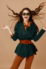 emotional woman with tousled hair fashion modern style beige background