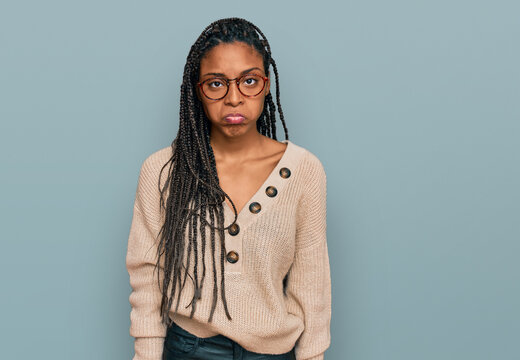 African american woman wearing casual clothes depressed and worry for distress, crying angry and afraid. sad expression.