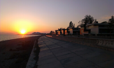Sunset on the Black Sea in the city of Sochi. Adlerovsky district. Imeretinskaya lowland