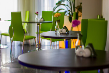 Green chairs in the restaurant
