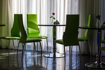 Green chairs in the restaurant