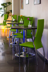 Green chairs in the restaurant