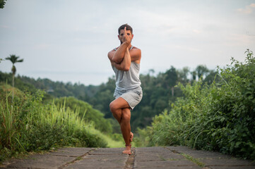 Man practice Yoga practice and meditation outdoor