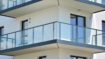 Fototapeta premium Condominium and apartment building with symmetrical modern architecture in the city downtown.