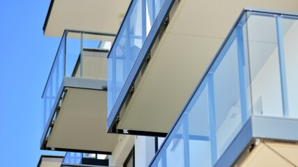 Condominium and apartment building with  symmetrical modern architecture in the city downtown.