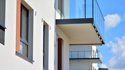 Condominium and apartment building with  symmetrical modern architecture in the city downtown.