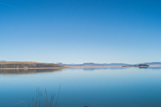 Mono lake, California in Autumn on sunny day with clear blue sky and tufa - Powered by Adobe